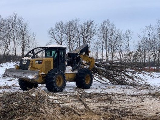 Grand Haven Land Improvement with Cat 525D Skidder